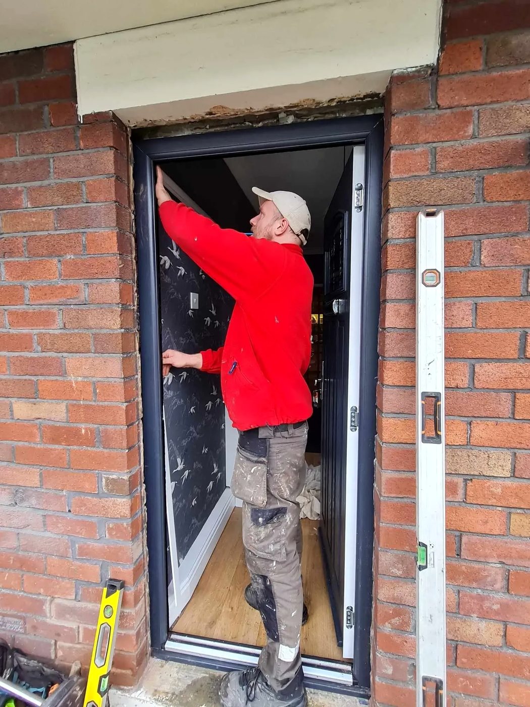 GBD fitter installing a new anthracite front door frame